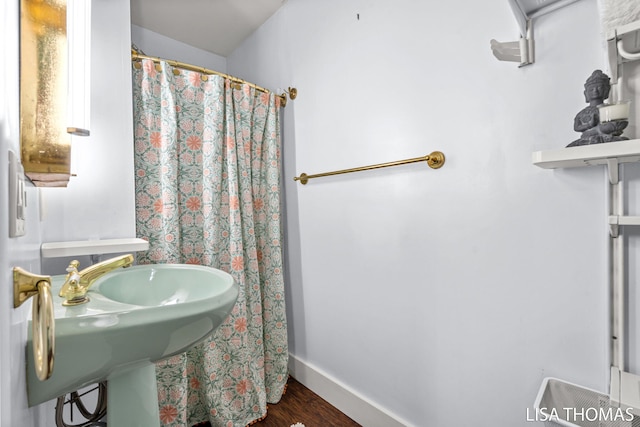 1000 Garfield Ave NW, Grand Rapids, MI 49504 - bathroom with wood finished floors and baseboards