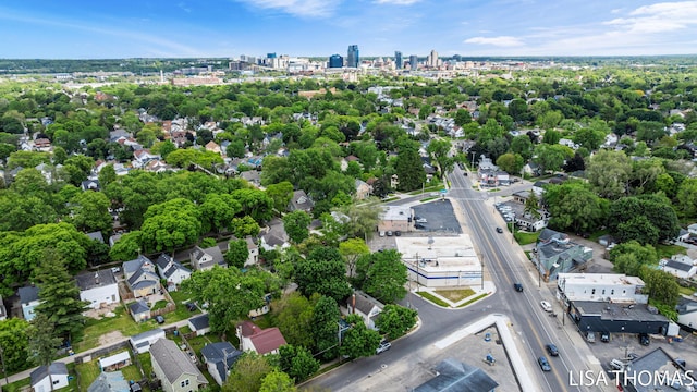 1000 Garfield Ave NW, Grand Rapids, MI 49504 - aerial overview of property's location featuring a tree filled landscape and nearby urban area