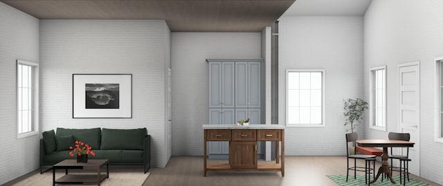 1000 Garfield Ave NW, Grand Rapids, MI 49504 - living room with light wood-style flooring and a high ceiling