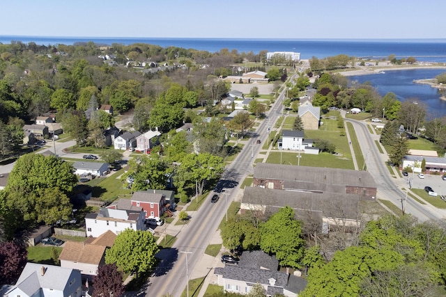 513 1st St, Manistee, MI 49660 - view of property location with a nearby body of water and nearby suburban area