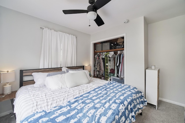 513 1st St, Manistee, MI 49660 - carpeted bedroom featuring a closet, ceiling fan, and baseboards