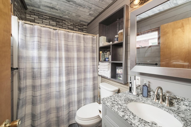 513 1st St, Manistee, MI 49660 - full bath with toilet, vanity, and curtained shower