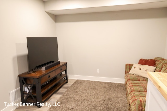 239 Monroe Ave, Muskegon, MI 49441 - living area featuring baseboards