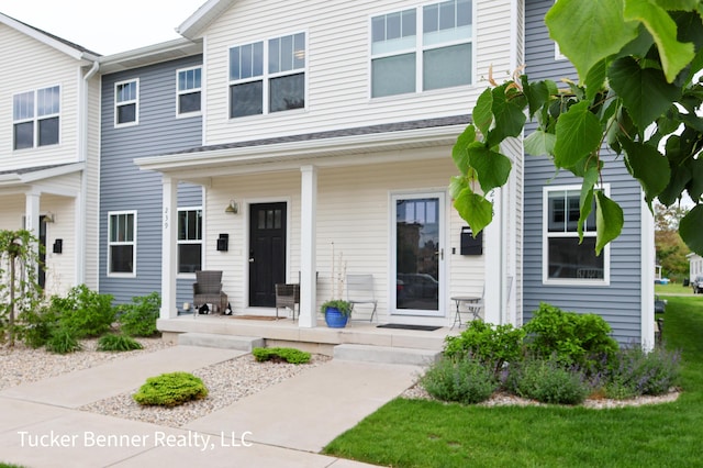 239 Monroe Ave, Muskegon, MI 49441 - view of front of house featuring covered porch