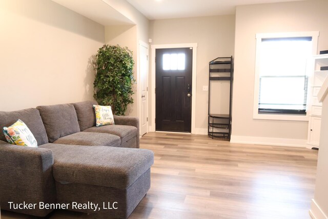 239 Monroe Ave, Muskegon, MI 49441 - entrance foyer with wood finished floors and baseboards