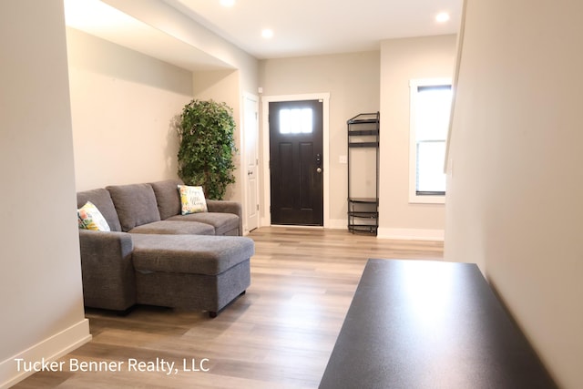239 Monroe Ave, Muskegon, MI 49441 - foyer with light wood-style floors, baseboards, and recessed lighting