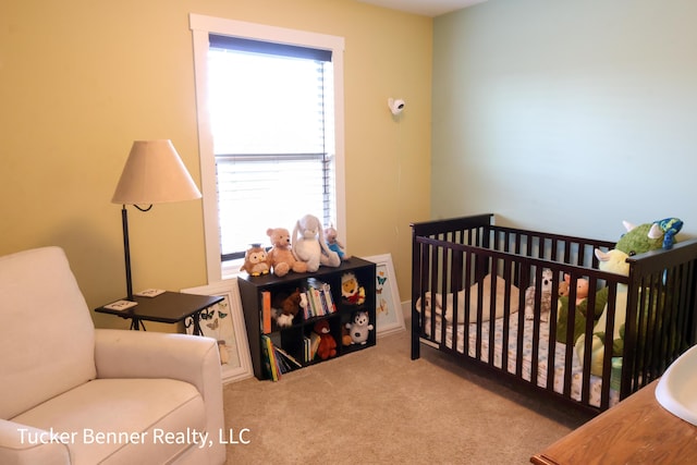 239 Monroe Ave, Muskegon, MI 49441 - bedroom featuring carpet flooring and a nursery area