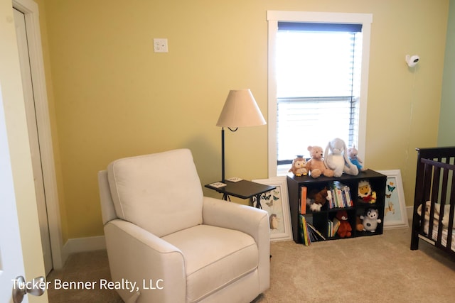 239 Monroe Ave, Muskegon, MI 49441 - living area with plenty of natural light and carpet