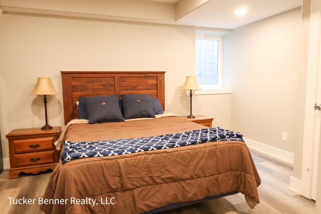239 Monroe Ave, Muskegon, MI 49441 - bedroom featuring wood finished floors, baseboards, and recessed lighting