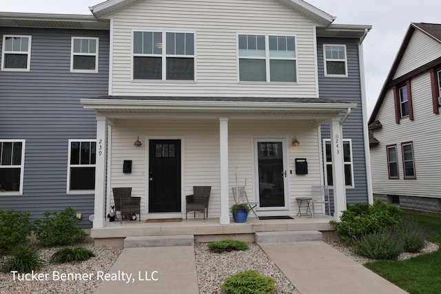 239 Monroe Ave, Muskegon, MI 49441 - view of front of home with covered porch