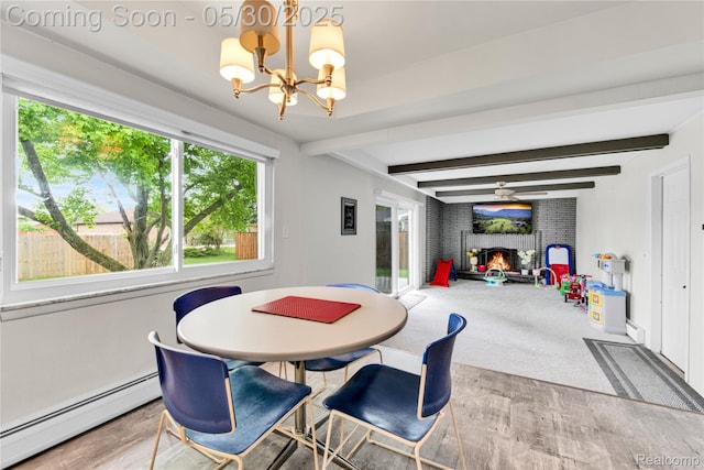 11030 Olive St, Warren, MI 48093 - dining area featuring a baseboard radiator, a chandelier, plenty of natural light, and beam ceiling