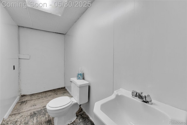 11030 Olive St, Warren, MI 48093 - bathroom with toilet, a drop ceiling, a sink, and baseboards