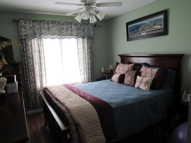 6044 Belmont Ct, Grand Blanc, MI 48439 - bedroom with dark wood-style floors and ceiling fan