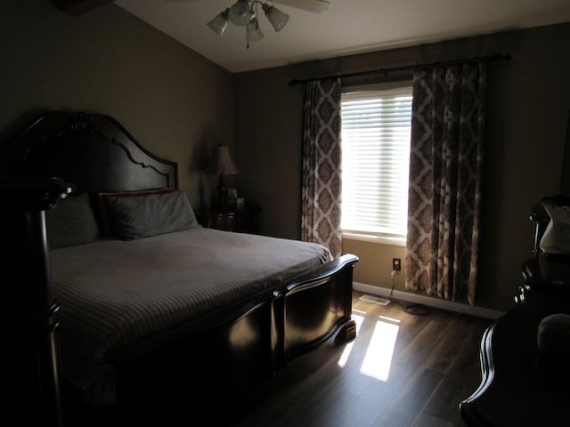 6044 Belmont Ct, Grand Blanc, MI 48439 - bedroom featuring lofted ceiling, wood finished floors, baseboards, and ceiling fan