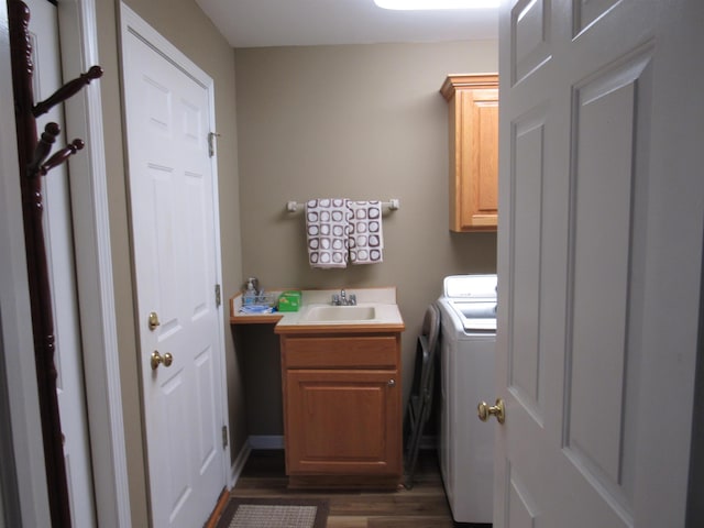 6044 Belmont Ct, Grand Blanc, MI 48439 - laundry area with cabinet space, dark wood-style flooring, and washer / clothes dryer
