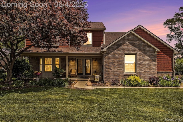 155 Woodridge Ct, Oxford, MI 48371 - view of front of property featuring a front lawn, roof with shingles, and covered porch