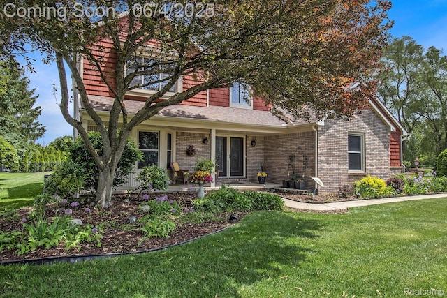 155 Woodridge Ct, Oxford, MI 48371 - view of front of property featuring a front yard and brick siding