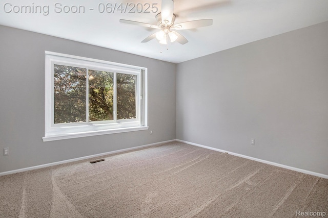 155 Woodridge Ct, Oxford, MI 48371 - carpeted spare room with a ceiling fan and baseboards