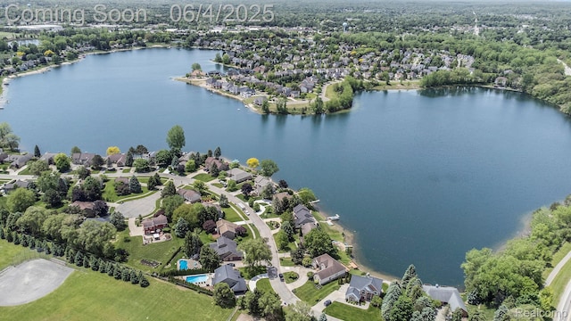 155 Woodridge Ct, Oxford, MI 48371 - aerial view of residential area featuring a large body of water