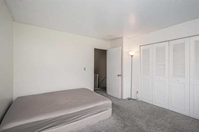 3407 Kenbrooke Ct, Kalamazoo, MI 49006 - carpeted bedroom with a closet