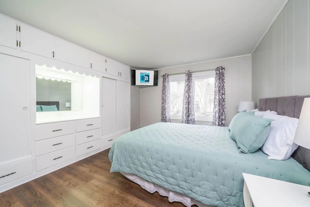 724 Wilson St, South Haven, MI 49090 - bedroom with dark wood-style flooring
