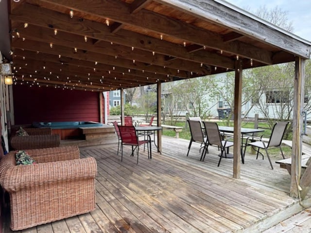 724 Wilson St, South Haven, MI 49090 - wooden deck with outdoor dining space and an outdoor hangout area