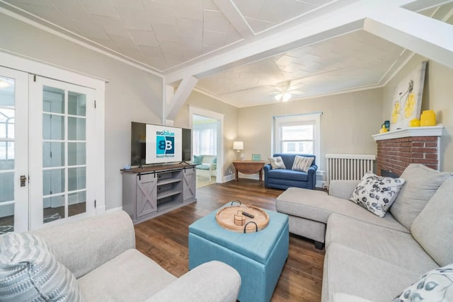 724 Wilson St, South Haven, MI 49090 - living room featuring crown molding, wood finished floors, baseboards, and ceiling fan