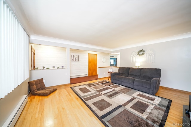 11523 Jenny Dr, Warren, MI 48093 - living area featuring a baseboard heating unit, a baseboard radiator, and wood finished floors