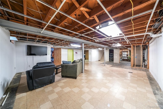 11523 Jenny Dr, Warren, MI 48093 - finished below grade area with tile patterned floors and stairway