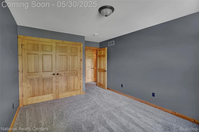 5257 Brookshire Dr, Almont, MI 48003 - unfurnished bedroom with carpet floors and baseboards