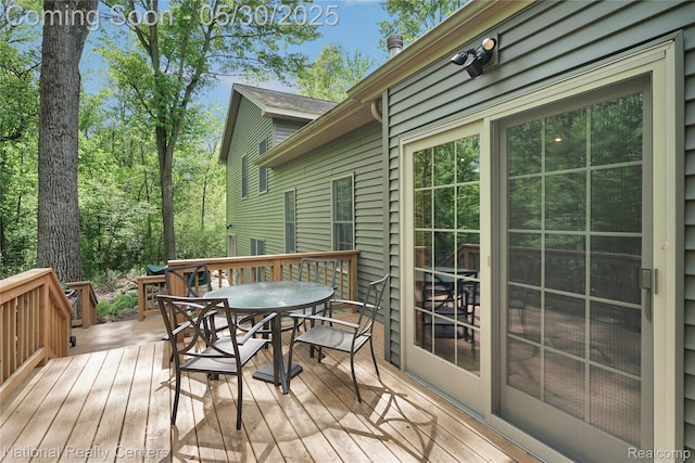 5257 Brookshire Dr, Almont, MI 48003 - wooden deck featuring outdoor dining space
