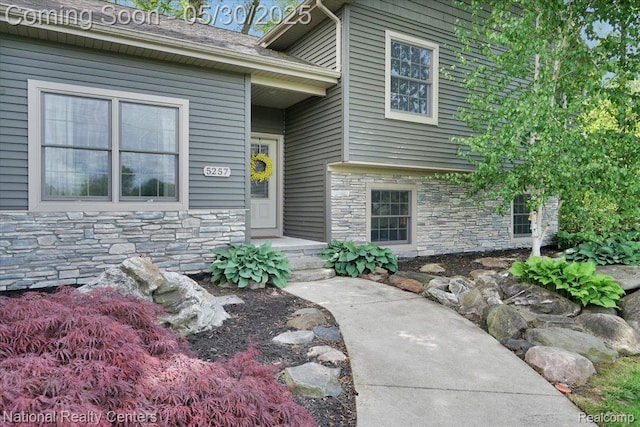 5257 Brookshire Dr, Almont, MI 48003 - entrance to property featuring stone siding