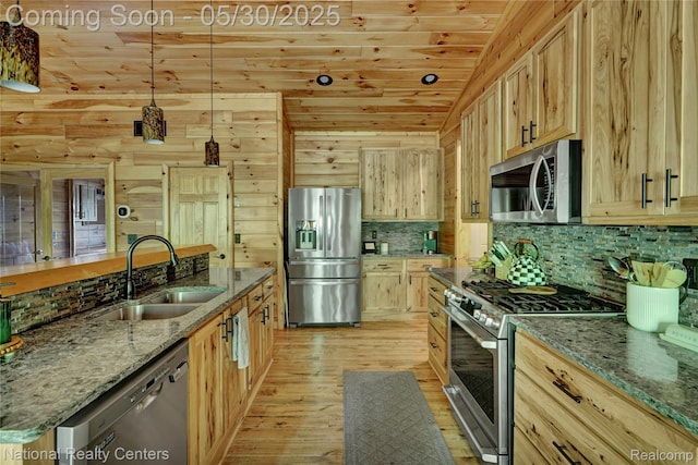 5257 Brookshire Dr, Almont, MI 48003 - kitchen featuring appliances with stainless steel finishes, a sink, wooden ceiling, light wood-style flooring, and decorative backsplash