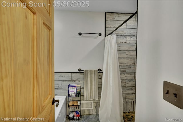5257 Brookshire Dr, Almont, MI 48003 - bathroom featuring a shower stall and a bath