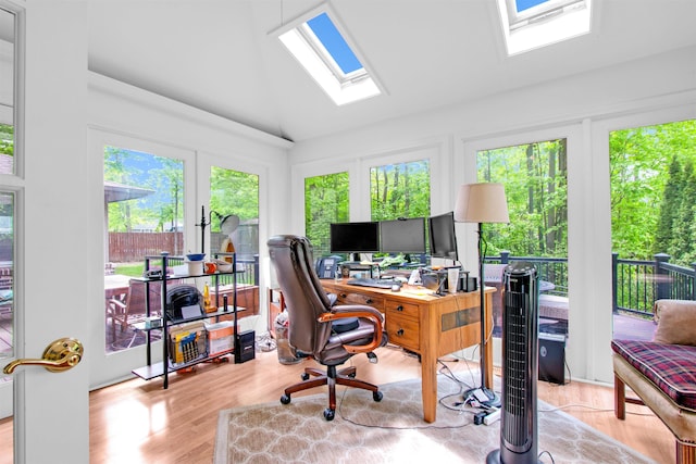 1330 Kings Carriage Rd, Grand Blanc, MI 48439 - office area featuring a skylight, lofted ceiling, wood finished floors, and french doors
