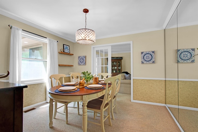 1330 Kings Carriage Rd, Grand Blanc, MI 48439 - dining room featuring ornamental molding, light carpet, and a chandelier