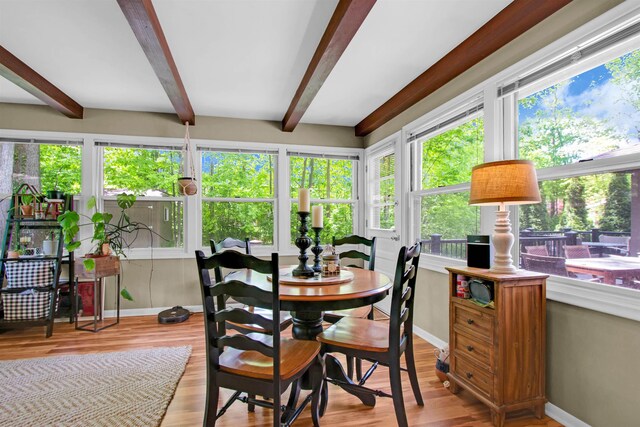 1330 Kings Carriage Rd, Grand Blanc, MI 48439 - sunroom with beam ceiling, baseboards, wood finished floors, and french doors