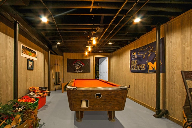 1330 Kings Carriage Rd, Grand Blanc, MI 48439 - rec room with billiards, wood walls, and finished concrete flooring