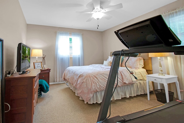 1330 Kings Carriage Rd, Grand Blanc, MI 48439 - bedroom with light carpet, ceiling fan, and baseboards