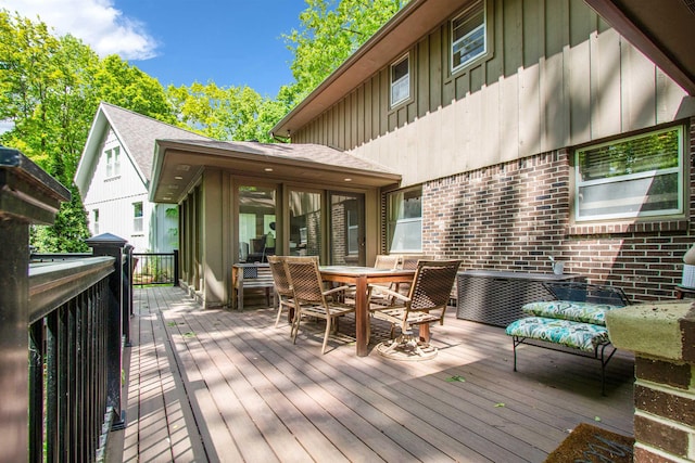 1330 Kings Carriage Rd, Grand Blanc, MI 48439 - wooden terrace featuring outdoor dining space