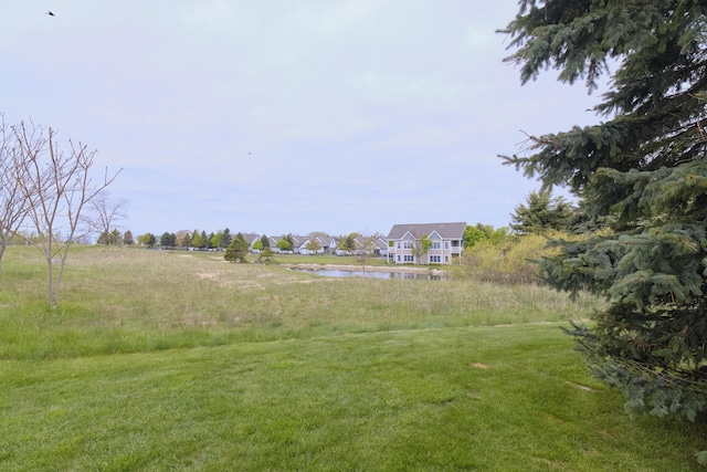 70 Spinnaker Dr, Manistee, MI 49660 - view of yard featuring a water view