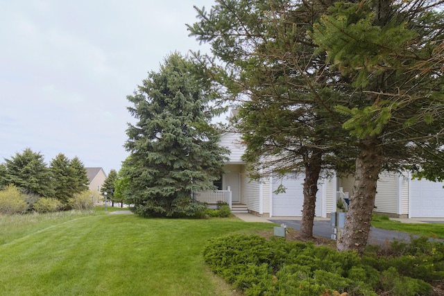 70 Spinnaker Dr, Manistee, MI 49660 - view of grassy yard