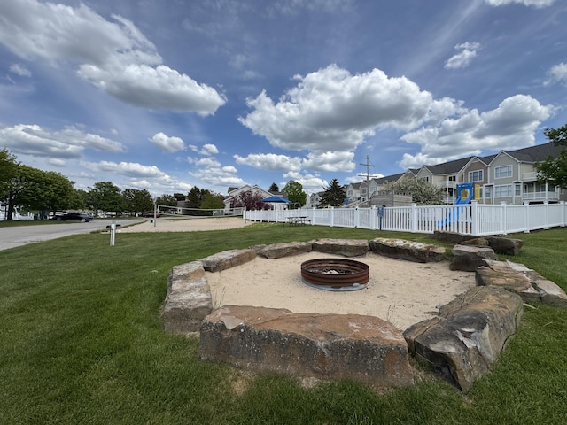 70 Spinnaker Dr, Manistee, MI 49660 - view of yard with an outdoor fire pit and volleyball court