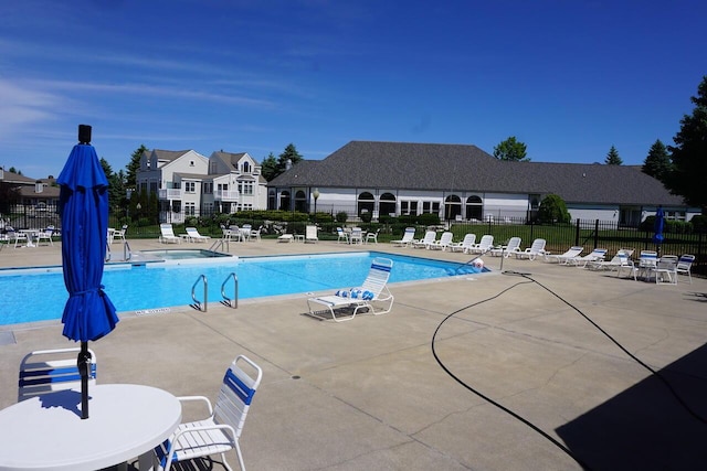 70 Spinnaker Dr, Manistee, MI 49660 - community pool with a patio