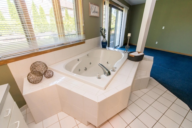 3007 Cedarbrook Rd, Ann Arbor, MI 48105 - full bath featuring a whirlpool tub, tile patterned floors, and vanity