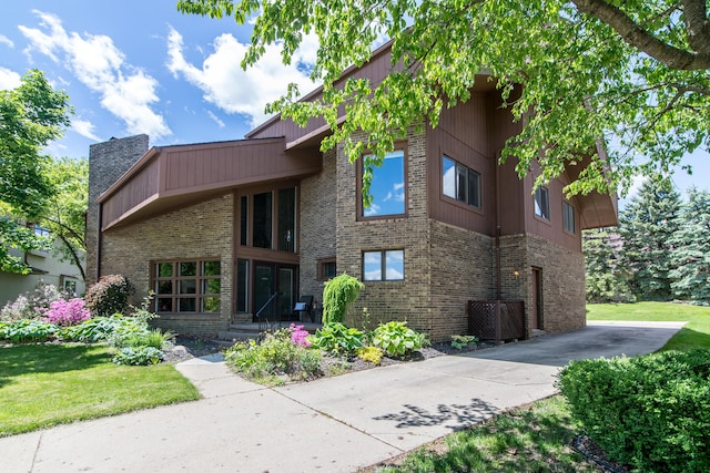 3007 Cedarbrook Rd, Ann Arbor, MI 48105 - view of building exterior with cooling unit