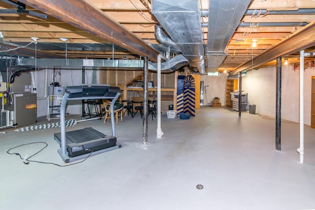 3007 Cedarbrook Rd, Ann Arbor, MI 48105 - unfinished basement with stairs, heating unit, and water heater