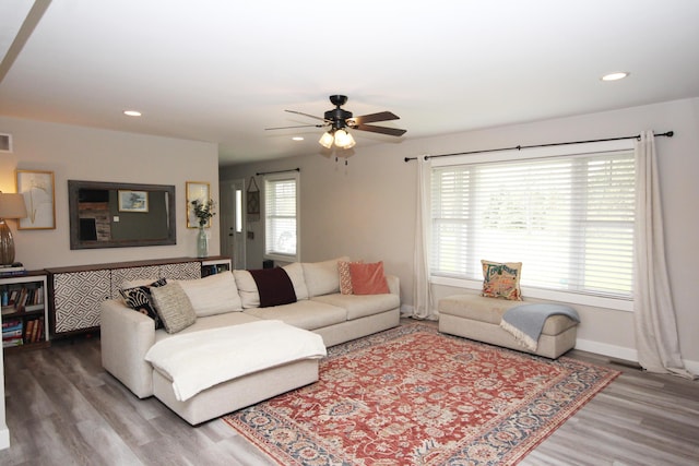 10141 S 33rd St, Vicksburg, MI 49097 - living area featuring a ceiling fan, wood finished floors, recessed lighting, and baseboards