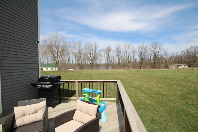 10141 S 33rd St, Vicksburg, MI 49097 - wooden deck featuring a grill and a lawn