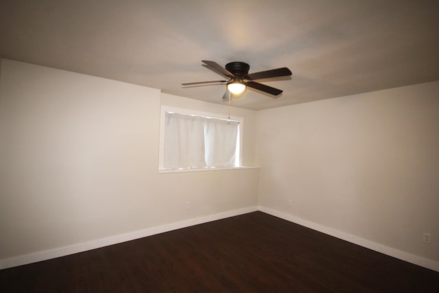 10141 S 33rd St, Vicksburg, MI 49097 - empty room featuring dark wood-style floors and a ceiling fan